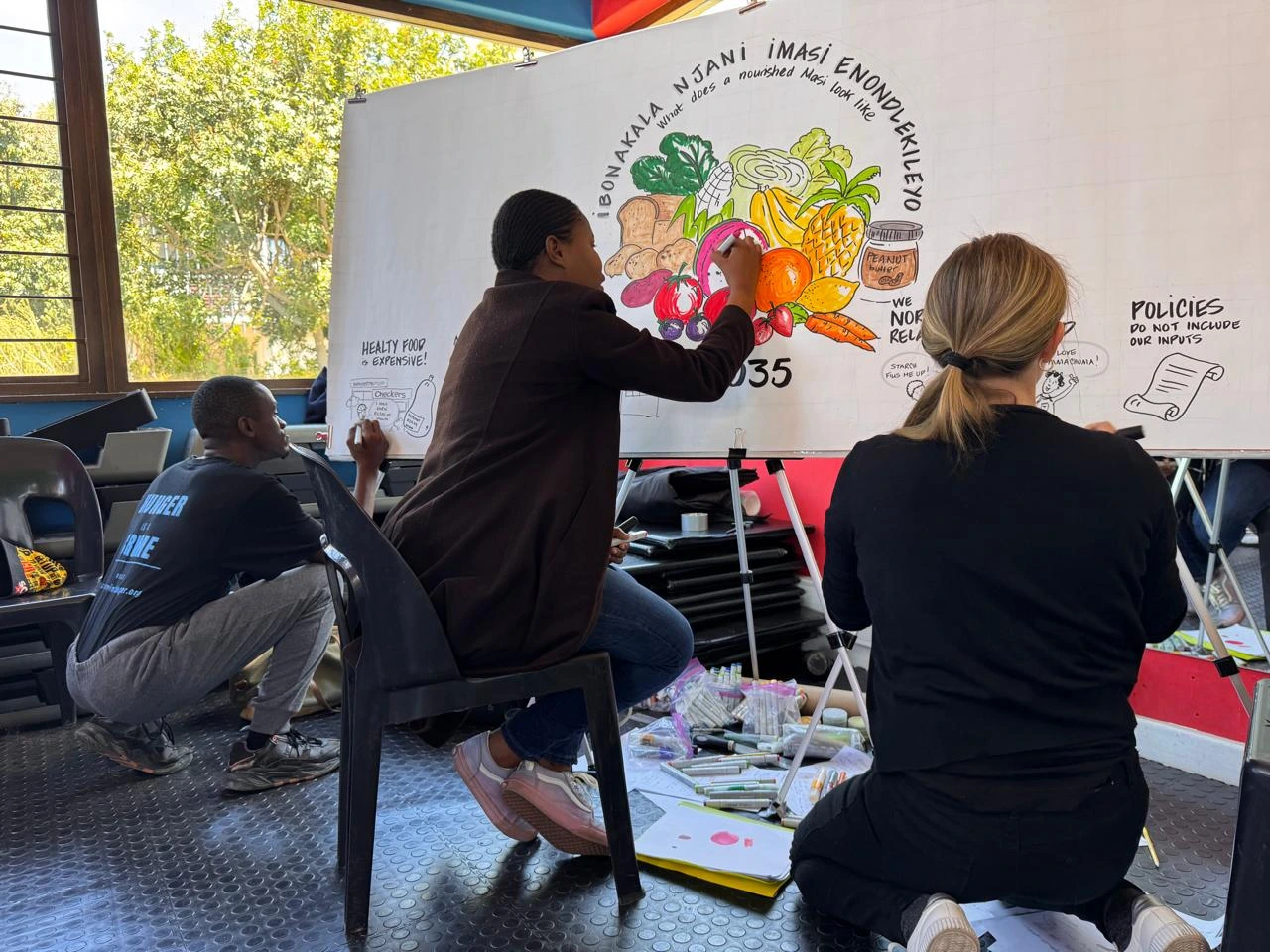 Young community members working on the hopeful future.